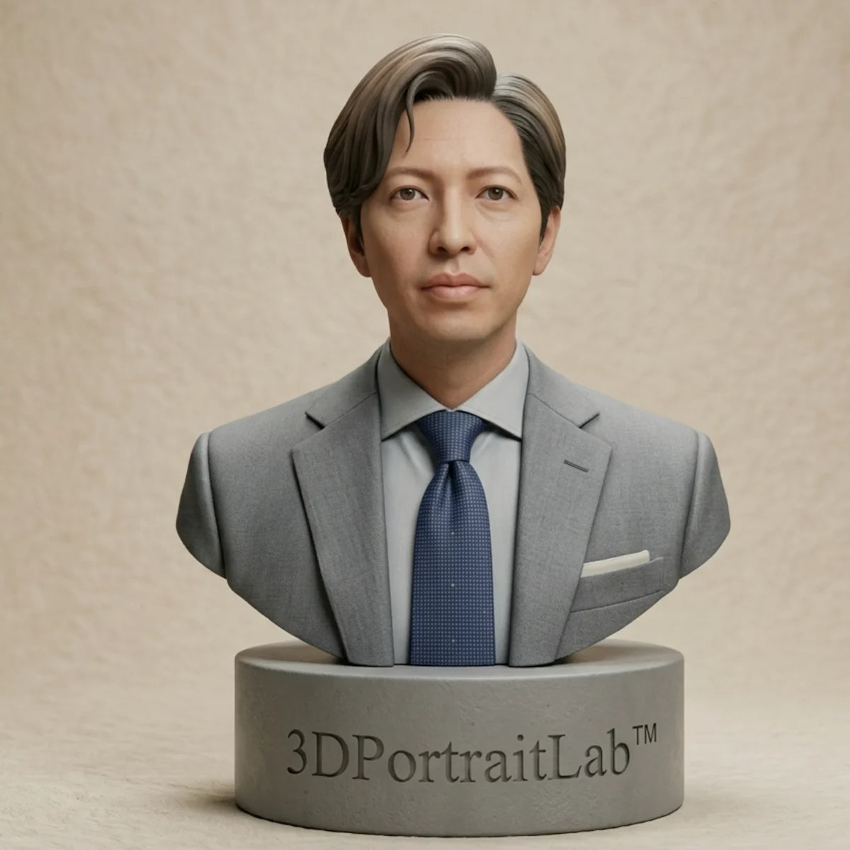Custom 3D printed portrait bust of a man in a gray business suit and tie — 3D Portrait Lab